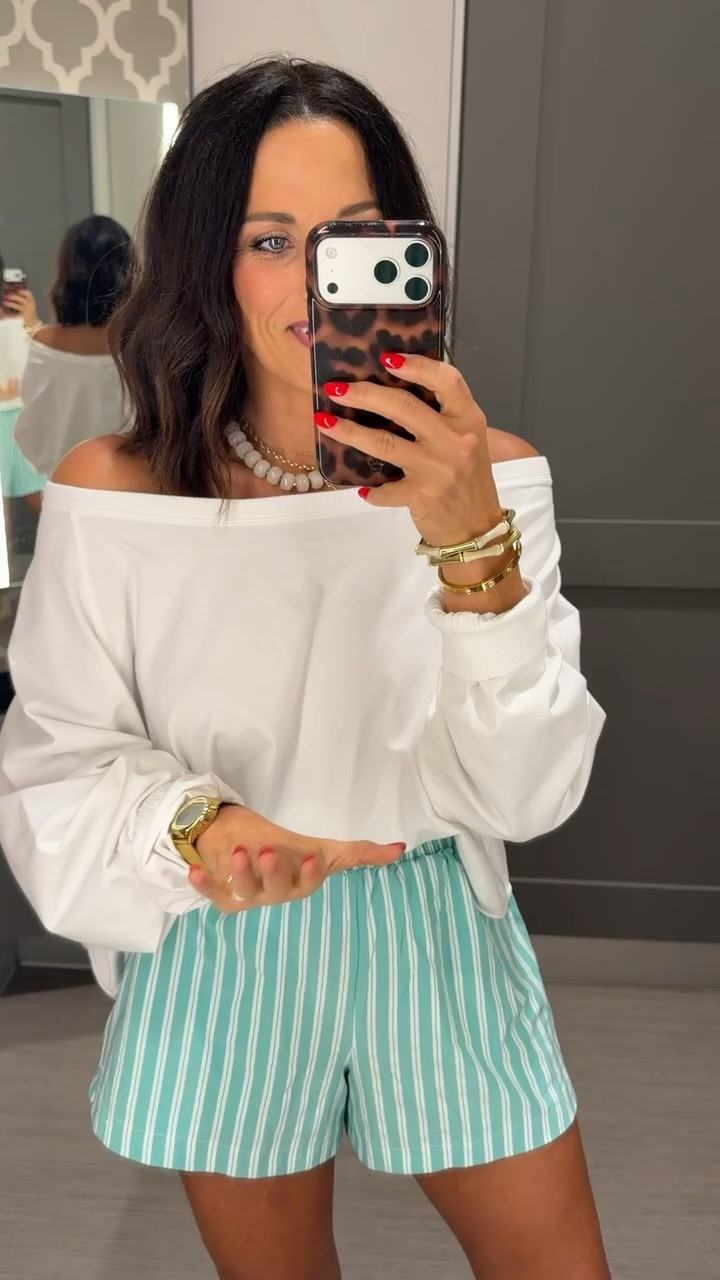 Such a good Free People Movement look for less from Target 👏🏻 The off-the-shoulder top is so cute with these striped shorts and looks way more expensive than it is! Wearing an XS.

#TargetFinds #TargetStyle #FreePeopleInspired #LookForLess #AffordableFashion #LTKStyle
