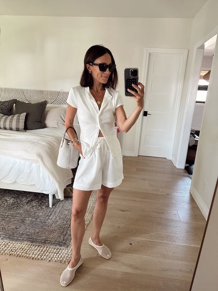 Today’s outfit a day date with the hubs 
Linen shorts- love how these are casually elevated with the drawstring and the length is so good
Ribbed polo is so comfortable and versatile- wearing my regular size, Xs 
Crochet ballet flats are true to size 