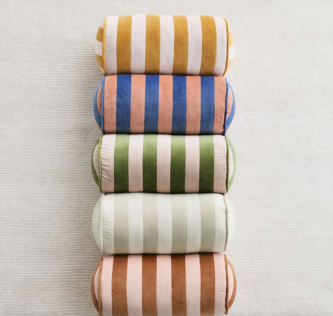 It's time for a salon furniture refresh and we got these bolsters from Crate & Barrel Kids in the blue & coral colorway. And they're on sale! 