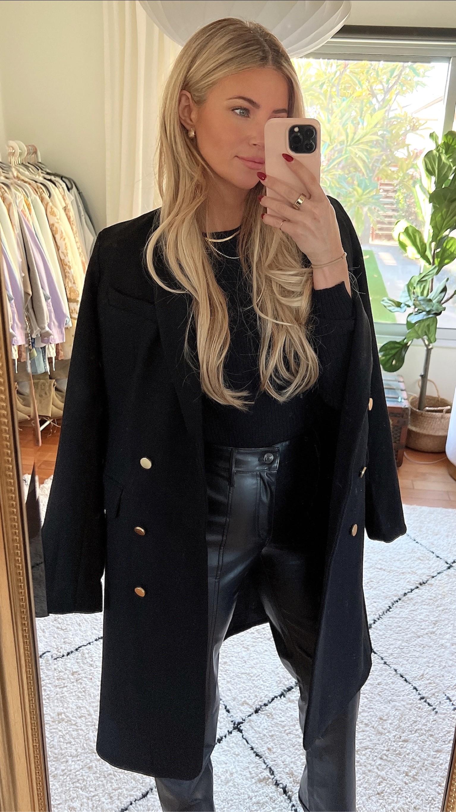 Wearing size small tops and coat. Size 4/5 pants 
