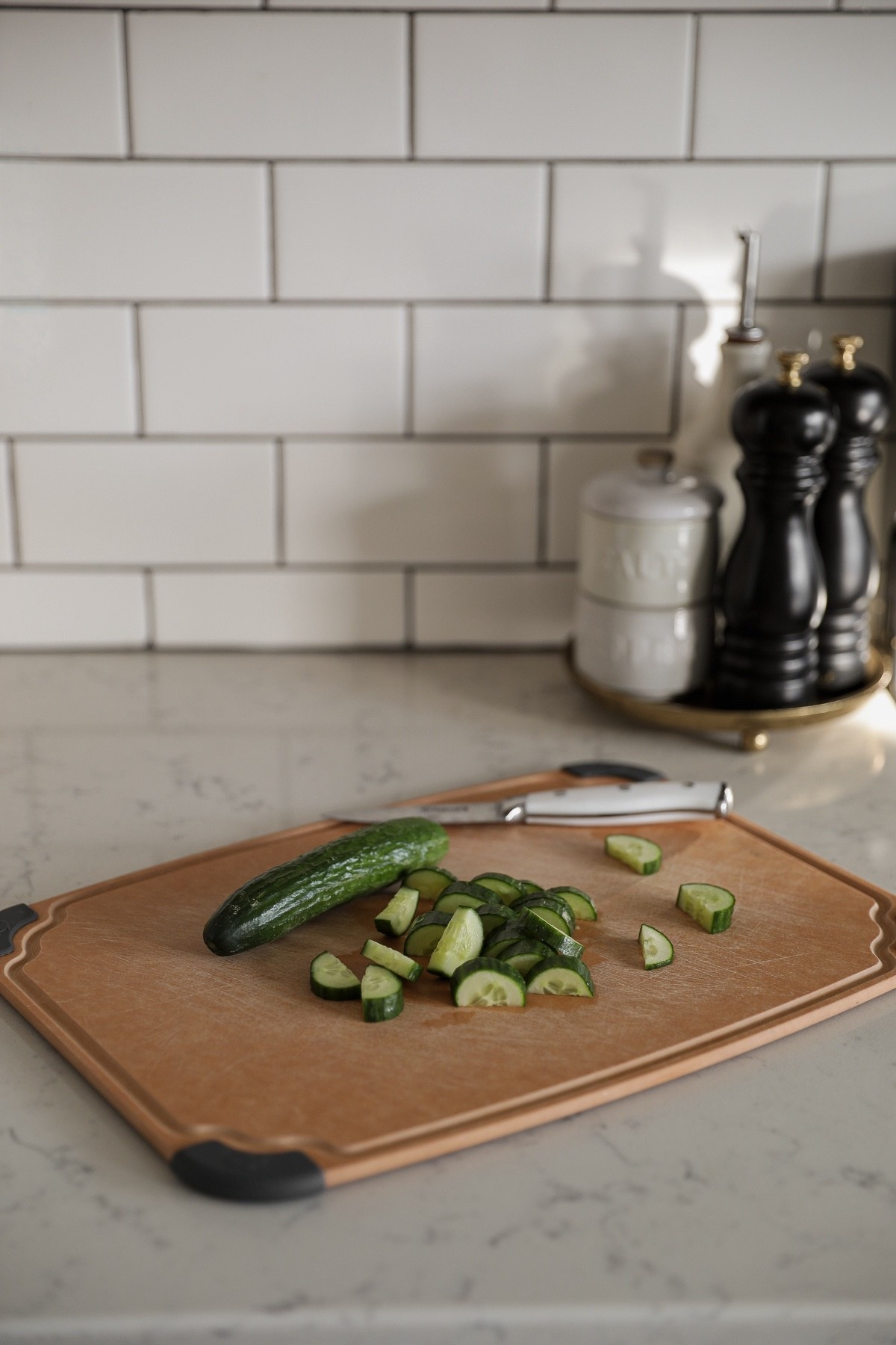 This was a kitchen item I hadn’t even considered until I learned that tiny particles from plastic cutting boards can end up in your food.

I wanted to find an alternative that felt just as low maintenance but without the risk of consuming microplastics. Traditional wood boards require upkeep, and I personally don’t love using them for raw meat. Wood fiber composite ended up being the perfect middle ground.

The board I use is non-porous, dishwasher safe, and incredibly sturdy. I love that it has a groove around the edge to catch liquids and rubber feet that keep it from sliding while chopping. It cleans easily, doesn’t hold odors, and feels solid and high quality.

#LTKHome