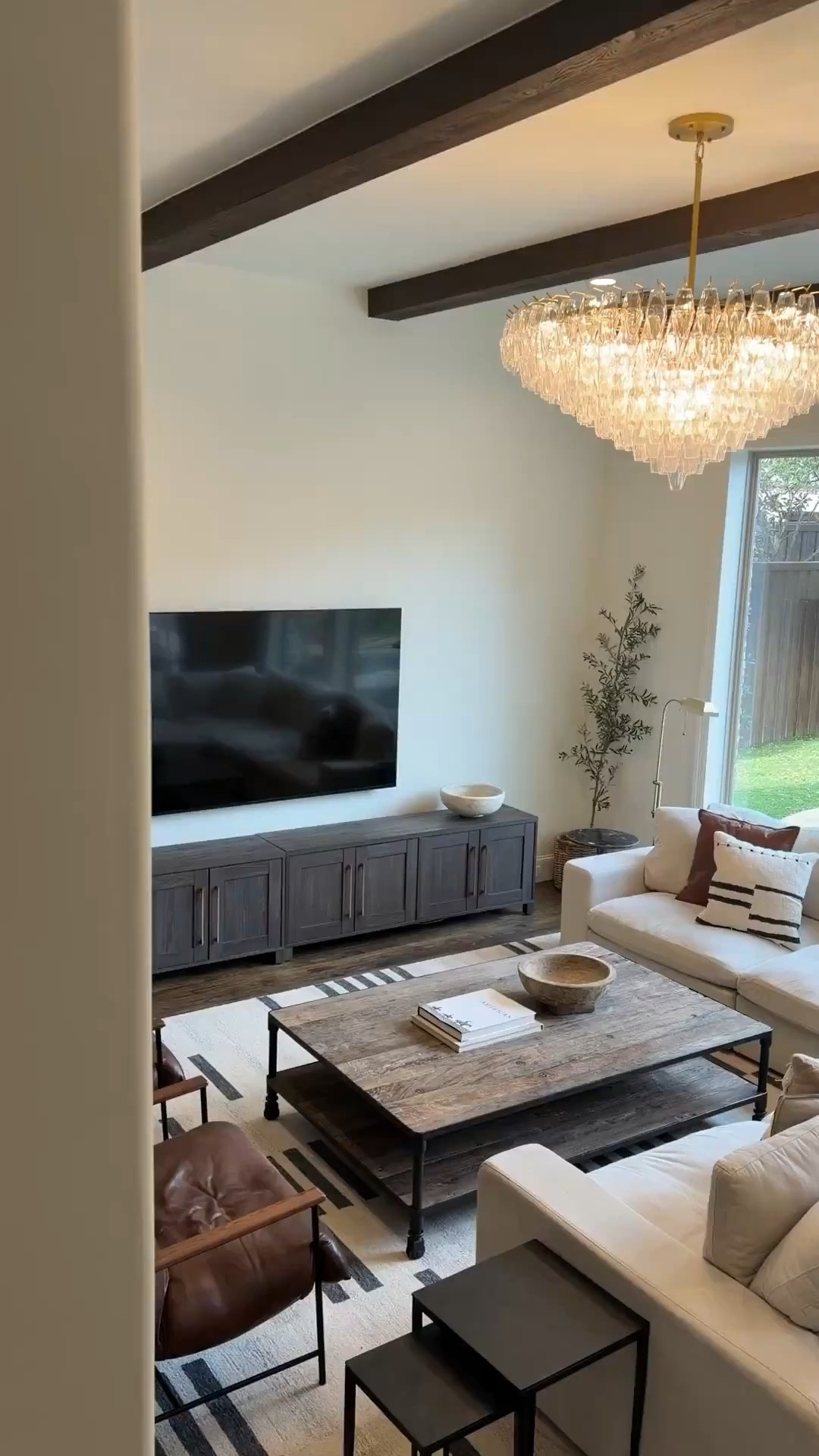 If you love warm neutrals, this is it. Beige sectional, dark wood floors, black and wood accents, cozy living room styling, modern rustic decor.

#LTKSeasonal #LTKHome