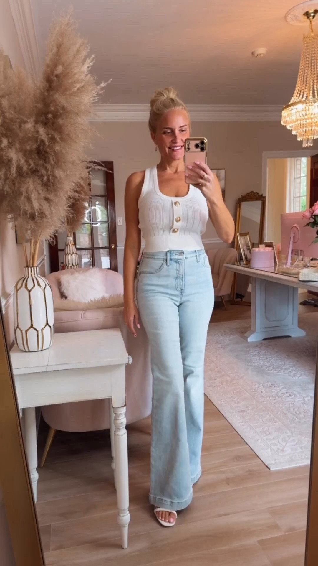 The cutest light wash jeans for summer.  Sooo stylish and fluttering! Have some stretch. They are across between a flare, jean and a wide leg jean. Just perfect. They run small so I sized up from a 4 to a 6 and they fit perfect.

#LTKdayinmylife #LTKgrwm #LTKootd