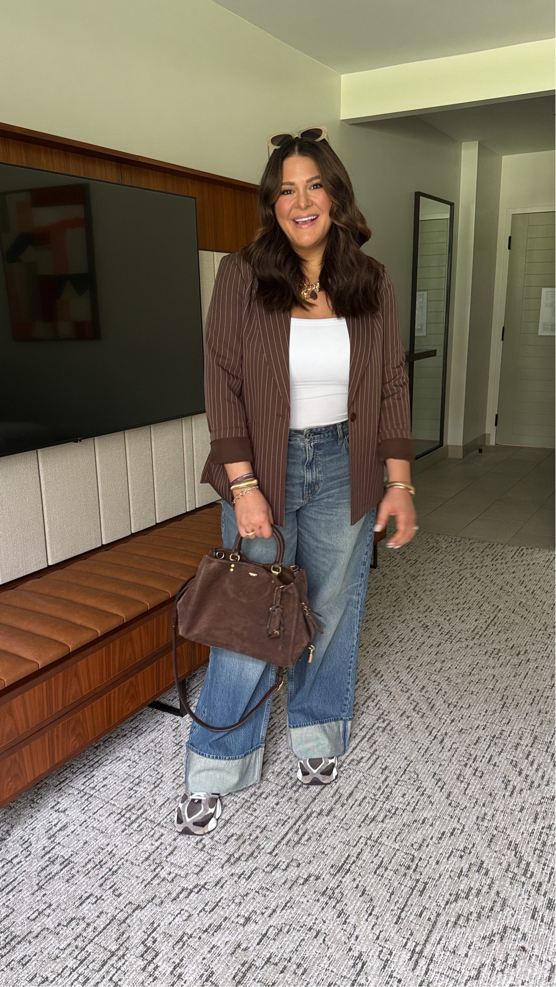 Blazer & Tank: Large • Jeans: 32 Long • This is exactly how I want to dress all fall — a little polished, a little oversized, and still comfortable enough for real life. The chocolate brown pinstripe blazer + white tank + wide leg cuffed jeans + sneakers is giving effortless cool girl without trying too hard.

#LTKootd #LTKgrwm #LTKMidsize