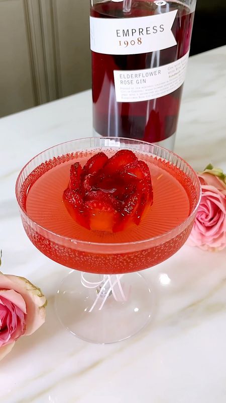 The most beautiful & delicious ROSE cocktail using @empress1908gin Elderflower Rose Gin |AD| 🌹This is the perfect drink to sip for wedding celebrations and Bridgerton premier parties! It not only has a beautiful rose color, but it’s also distilled in nine unique botanicals including, juniper berries, rose petals, elderflower, lavender, orange peel, orris root, cinnamon, coriander and black carrot. See full cocktail recipe below! #EmpressGin #EmpressIDO #SipResponsibly

INGREDIENTS:

1 oz Empress 1908 Elderflower Rose Gin
½ oz Lemon Juice
2-3 dashes of Simple Syrup 
1+ oz Champagne to top it off

#weddingcocktails #bridalshowerideas #bachelorettepartyideas #bridgerton #rosecocktail 

#LTKWedding #LTKHome #LTKParties