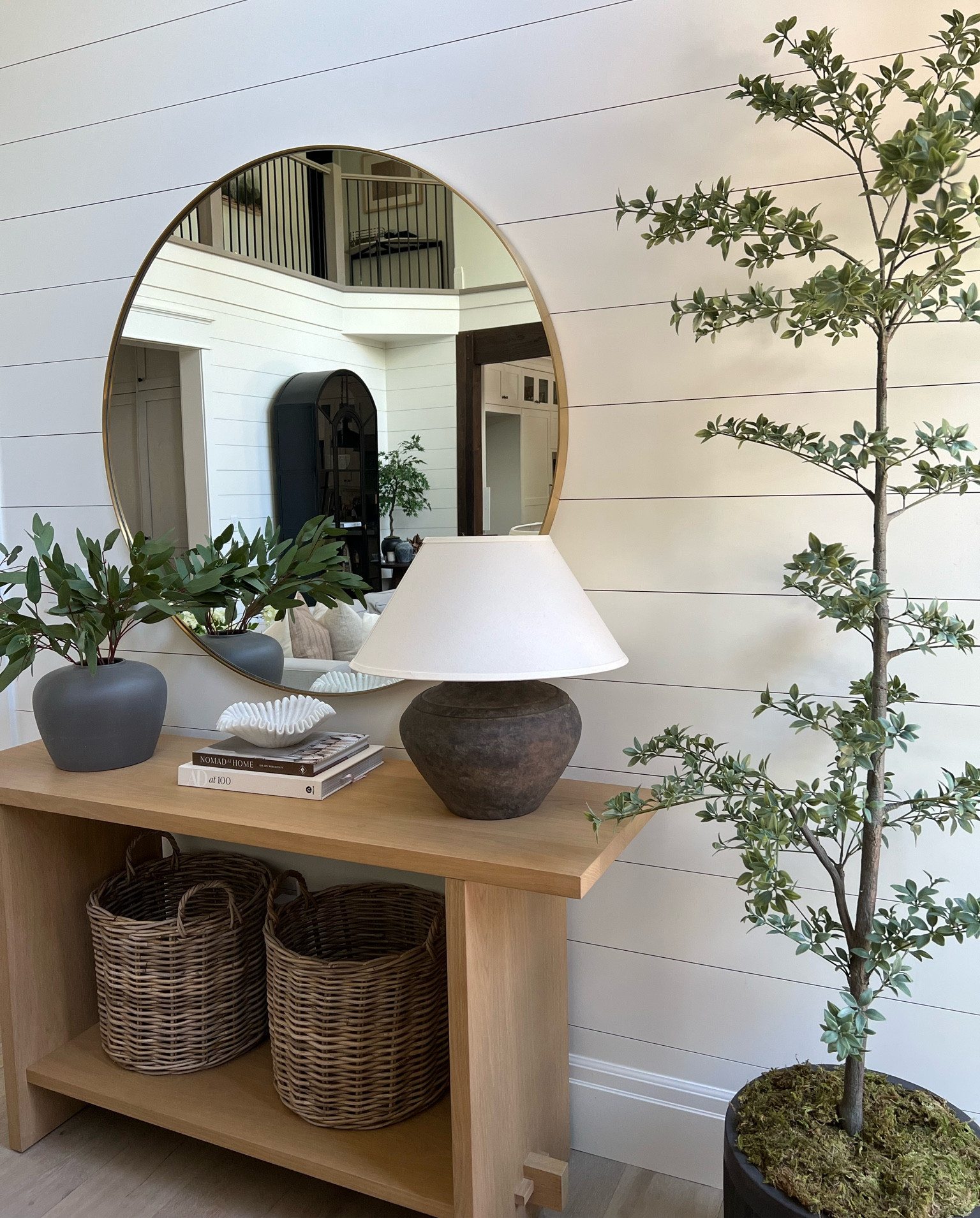 My new faux black olive tree from Pottery Barn and the gorgeous black fluted cement pot!  The pot is on sale right now!  It’s available in 4 colors and lot of different sizes.  Such good quality! 

My console table, mirror and the table lamp are also on sale during the McGee & Co Memorial Day sale! 🙌


Pottery Barn finds, 

#LTKhome #LTKstyletip #LTKsalealert