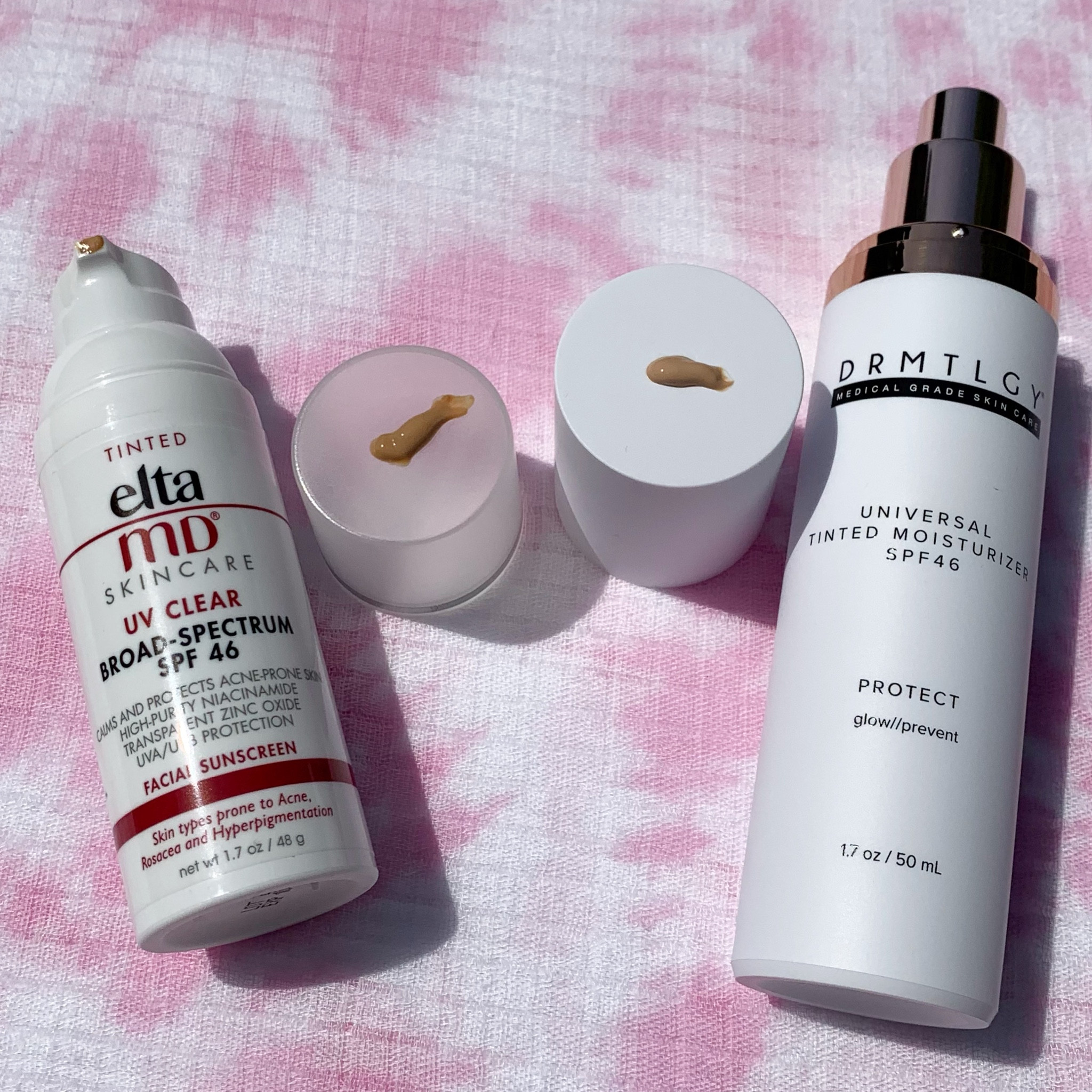 Pretty, pretty, pretty similar! 🤩

-Elta MD Tinted UV Clear SPF 46
Price: $45 (It was $38 when I ordered it for the first time— Elta MD has steadily increased the price of their products every few months for years.) 
Active ingredients: 9% Zinc Oxide, 7.5% Octinoxate 
Features: Niacinamide, hyaluronic acid

-DRMTLGY Universal Tinted Moisturizer SPF 46
Price: $28 (It was $26 when I ordered it for the first time.)
Active ingredients: 12% Zinc Oxide, 7.5% Octinoxate 
Features: Niacinamide, hyaluronic acid

On top of being $17 less — The DRMTLGY one is slightly less warm, which is a huge plus for moi/my skin tone! Most tinted sunscreens are a touch too warm on my skin as I am quite fair — I’ll share the tinted sunscreen I would recommend if you’re in the same boat in stories! 

Heads-up that they both smell like plastic and the scent doesn’t exactly go away, but protected skin is happy skin, especially in the long run! 

Have you tried either of them!? What’s your favorite sunscreen!? (Tinted or untinted.) 🤩

#LTKbeauty #LTKitbag #LTKfindsunder50