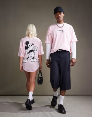 ASOS DESIGN Disney unisex oversized t-shirt with Mickey Mouse prints in washed pink | ASOS (Global)