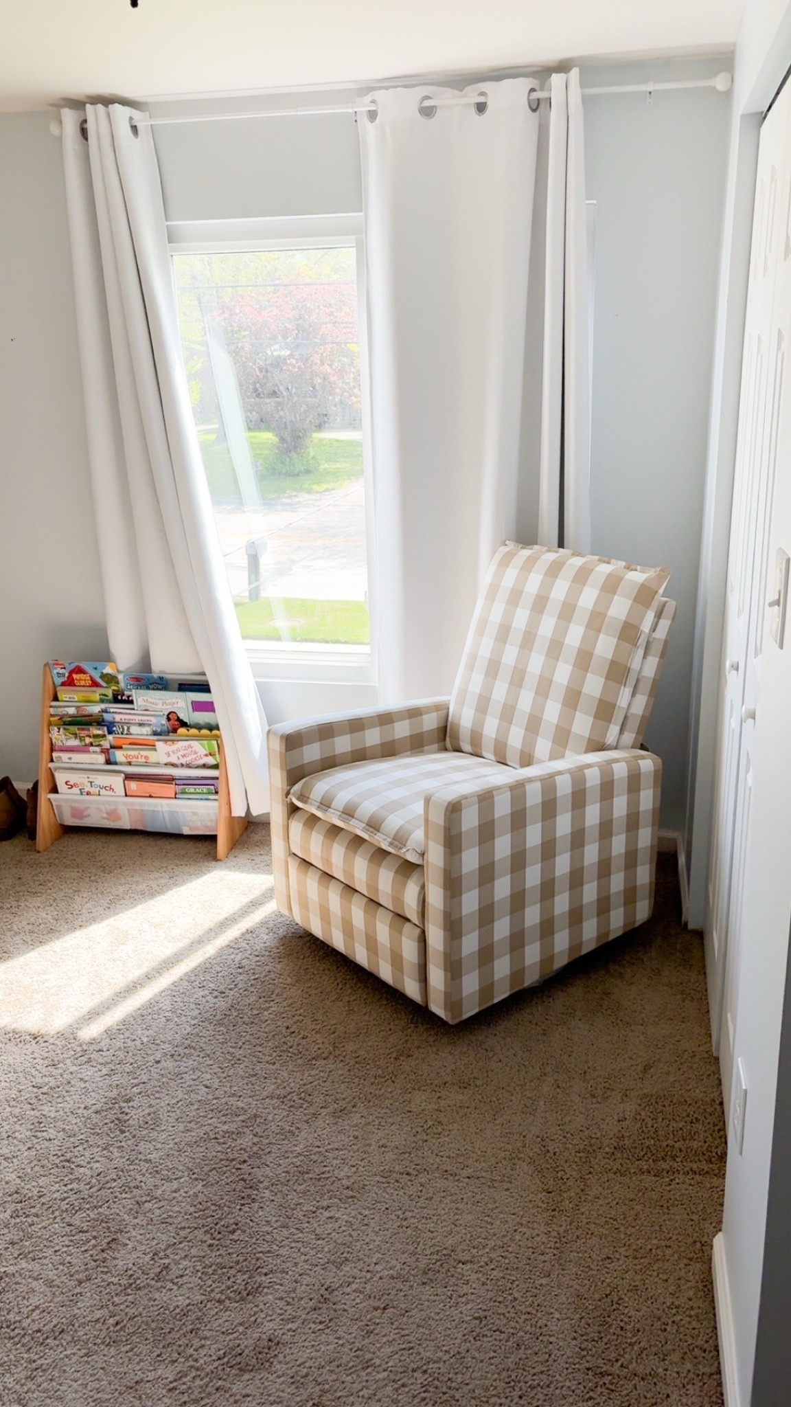 Our gingham nursery chair is one of my favorite pieces in the room. It reclines, swivels, and rocks—basically everything you want for late-night feeds and snuggles. The classic pattern adds the perfect touch to our subtle nautical nursery theme.
The blackout shades are also linked here. There’s several different colors. We chose White 💎 to go along with our theme. We also have the bookshelf that saves us holding so many books for our kids.

#LTKstorytime #LTKBaby #LTKBump