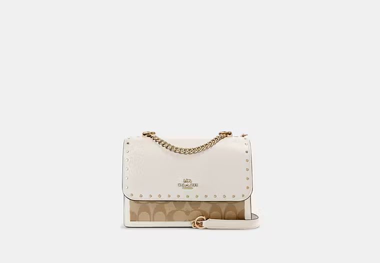 Smooth leather, Signature coated canvas and snake-embossed leather | Coach Outlet