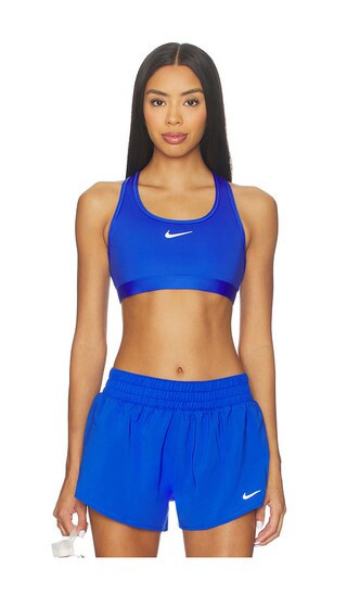 Nike Padded Sports Bra in Blue. - size S | Revolve Clothing (Global)