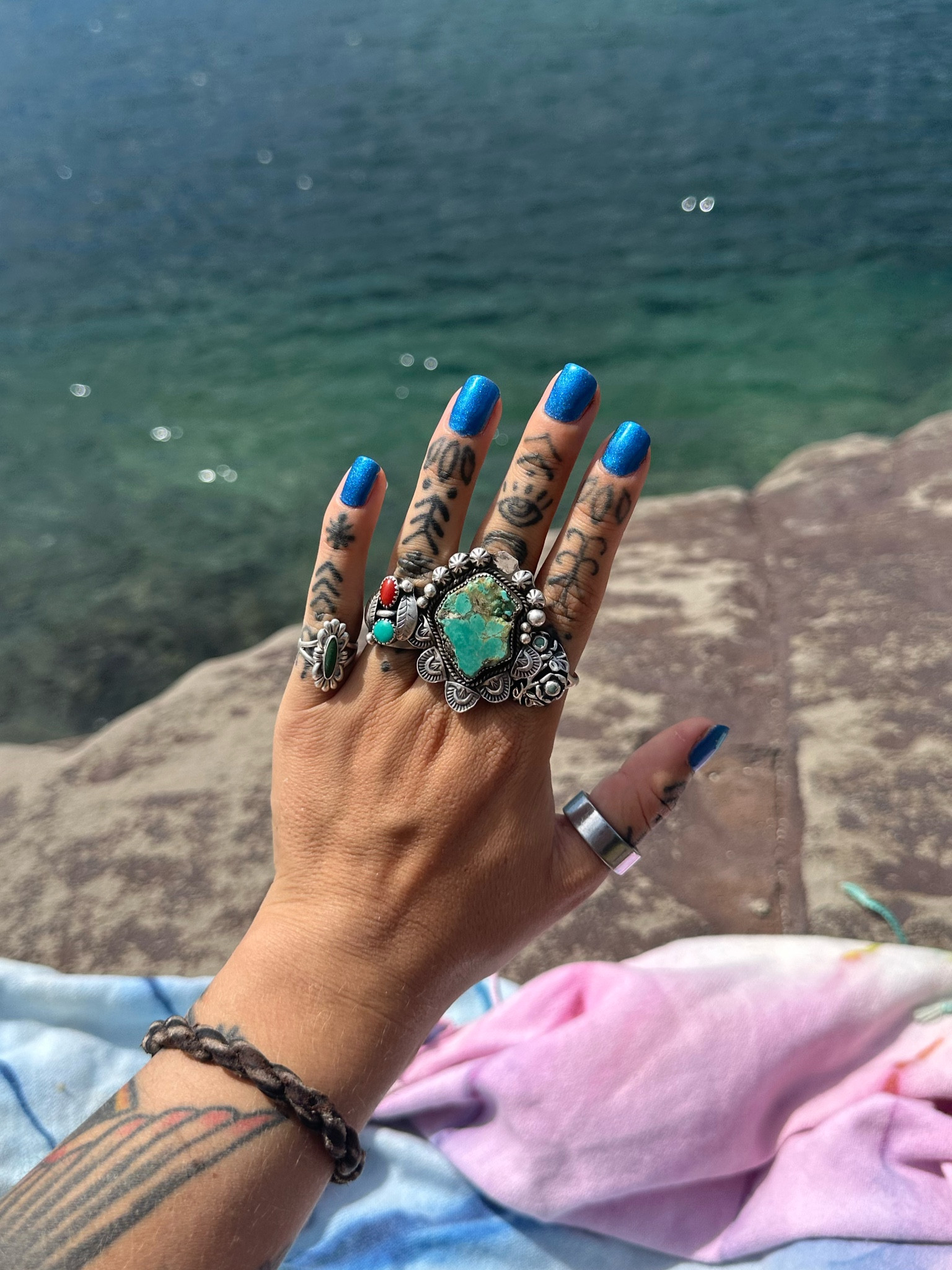 Blue chrome nails- I achieved this look by just applying the powder over one coat of silver polish and the top coat!