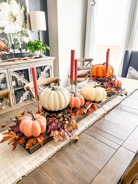 Hey there! Walmart is killing it with their faux pumpkins this year! They look like the fancy expensive ones but are actually cheap! You can easily recreate my Fall centerpiece without busting your budget. Get the details on my blog, www.chiconashoestringdecoratingblog.com

#chiconashoestringdecorating #fallcenterpiece #falltablescape #walmartdecor

#LTKhome #LTKSeasonal #LTKHalloween