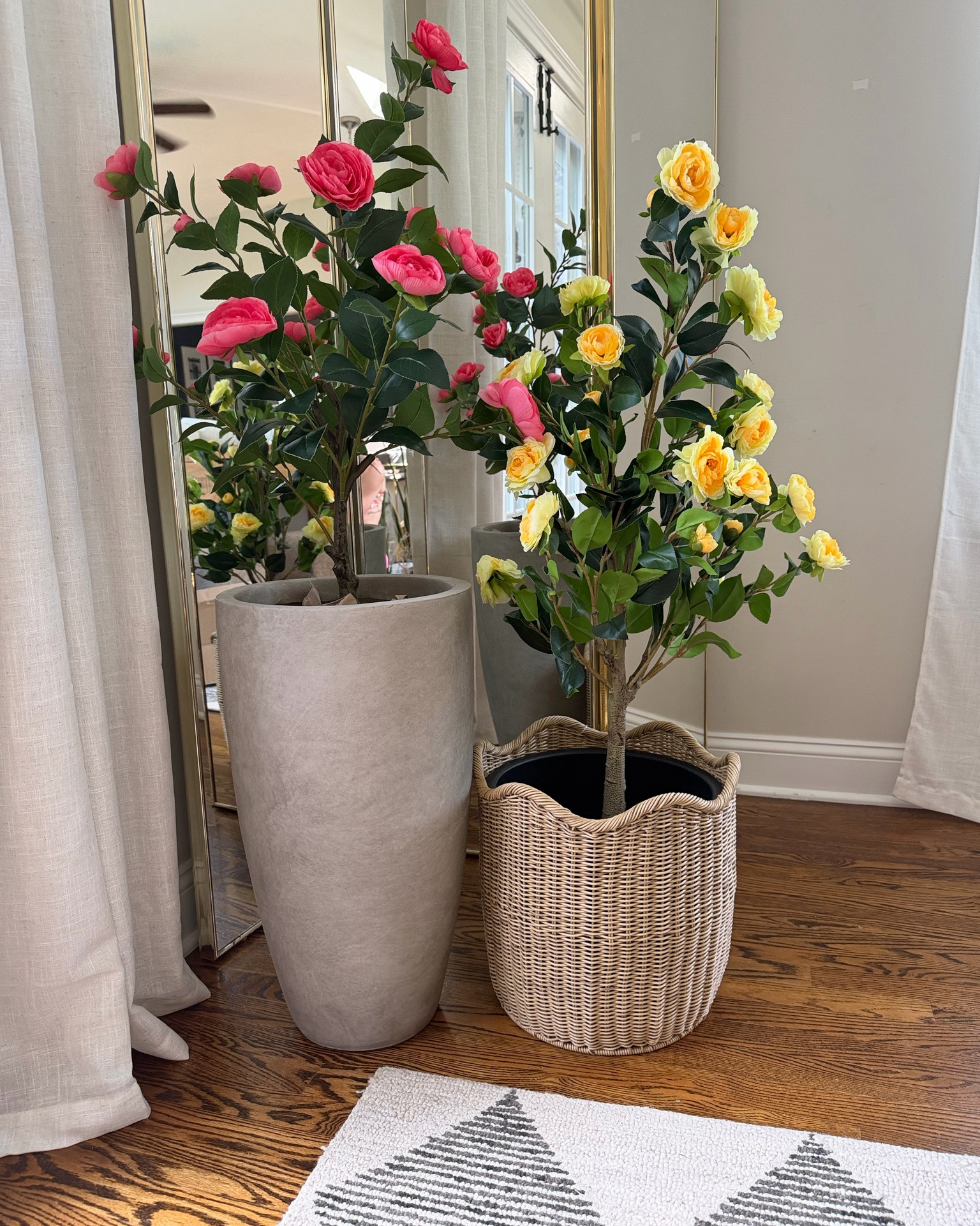 artificial camellia trees 🪴 
comparing two different brands (& heights) from Amazon!

🌸 pink: 3 FT
🌼 yellow: 4 FT

PRO TIP  🍋  Style a plant inside a wicker planter or woven basket to achieve a grandmillennial / coastal cottage style aesthetic this summer! 
    👉🏻  To prop it up, turn a small plastic planter upside-down and place it at the bottom of the planter. Then place the tree on top to give it height!  Lastly, secure it by stuffing  styrofoam pool noodles or bubble wrap around the base to fill the empty space!


🐚 FOLLOW @HomesWithChristina for more interior decorating tips & affordable home decor finds!

.
.
summer home decorating tips 
interior design tips
designer-inspired linen curtains under $20!
cottagecore aesthetic
coastal throw pillow refresh 
beach house decorating inspo
modern coastal home decor
coastal living room decor
coastal style home | summer decor | summer home refresh | luxe for less decor |
#summerdecor #summerhome #coastalstyle  #affordabledecor #beachhousestyle #cottagecore
#coastalliving #shorehousedecor

#LTKSeasonal #LTKHome #LTKSaleAlert