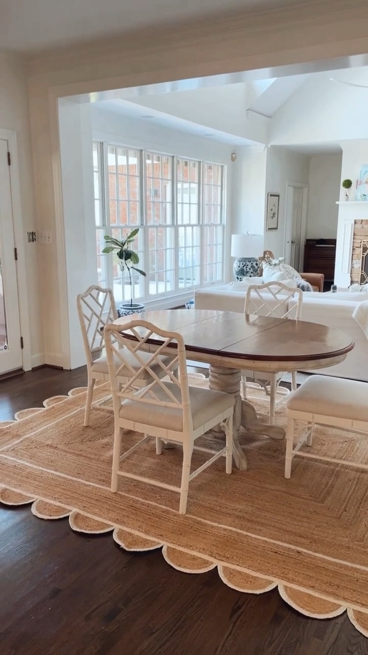 Scalloped jute rug dining kitchen table pedastool wooden table white chippendale rattan chairs grandmillennial style 

#LTKunder50 #LTKhome #LTKsalealert