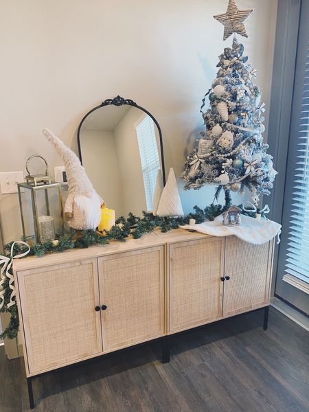 My apartment Holiday decorations
✨🎄

I bought this set of 2 storage cabinet on Amazon during cyber week, and so far, they’ve been working great. Plenty of storage inside. I love them! Available in black and beige rattan, single cabinet or 3 doors.

 🏷️
•Vintage arched black mirror 🪞
•XIAO WEI Sideboard with Handmade Natural Rattan Doors



[Rattan Cabinet Console Table Storage Cabinet Buffet Cabinet, for Kitchen, tv console, bedroom, powder room, Living Room, Hallway, Entryway, Black Christmas tree, garland, glass lantern holiday decor, holiday favorite, cabinet for entryway, black cabinet, console table for entryway home furniture under $200 under $300 cabinets with doors under $300 neutral home decor]

#LTKhome #LTKHoliday #LTKSeasonal