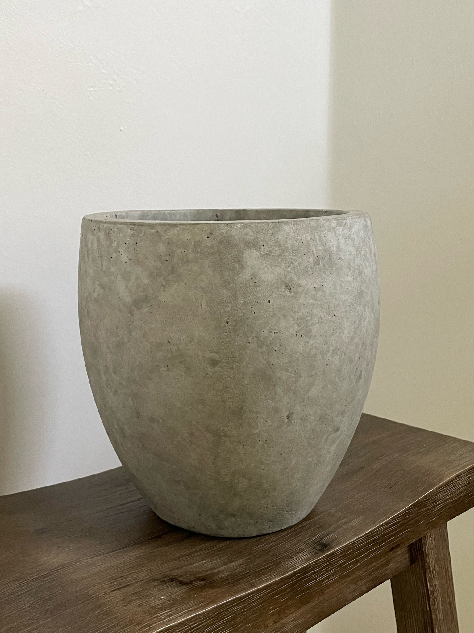 Must have summer concrete planter! I bought mine last summer and have been loving it since! Comes in multiple sizes and shapes too!

#LTKHome #LTKFindsUnder100 #LTKFindsUnder50
