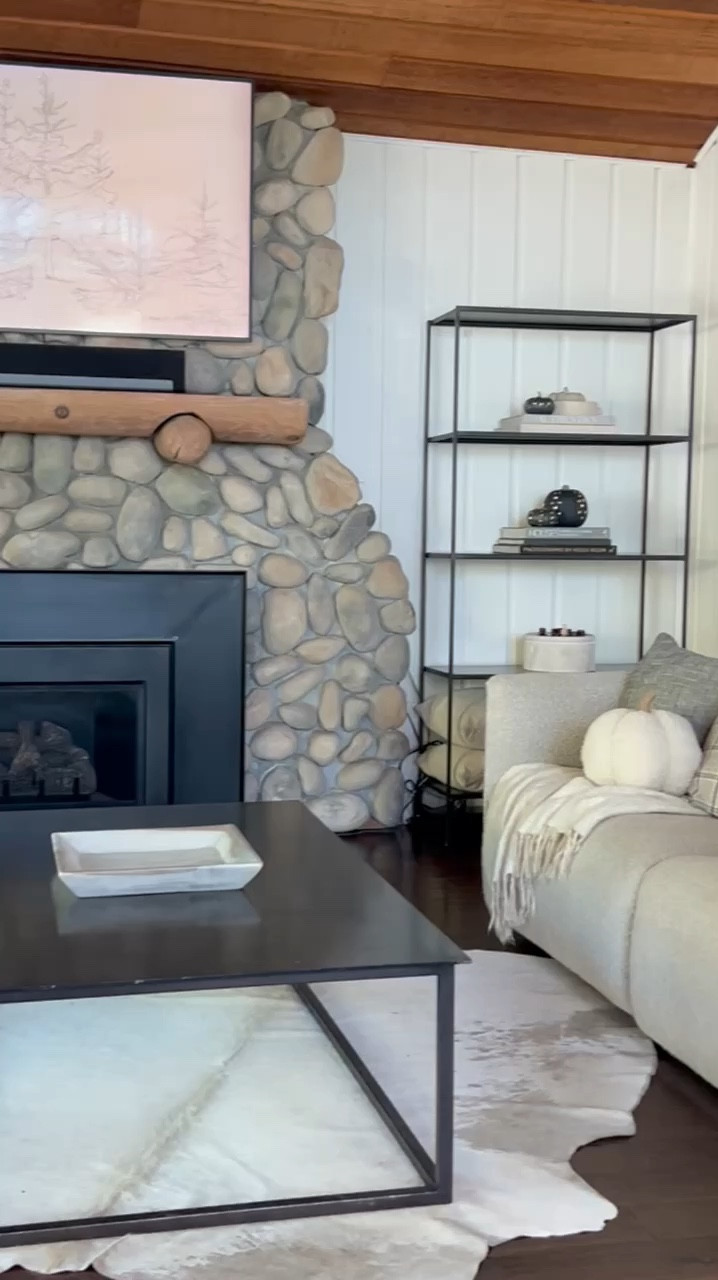 Transform your living room into a cozy fall haven with these affordable neutral finds! Discover battery-operated sconces with a timer for effortless lighting, and pair them with flameless candles to set the perfect ambiance. Add a touch of autumn with plaid pillows and a fuzzy pumpkin pillow, and elevate your space with stone decor accents. Don't forget to layer on the warmth with soft, inviting blankets. These budget-friendly pieces are perfect for creating a stylish and comfortable retreat this season!

#LTKHome #LTKFindsUnder50 #LTKSeasonal