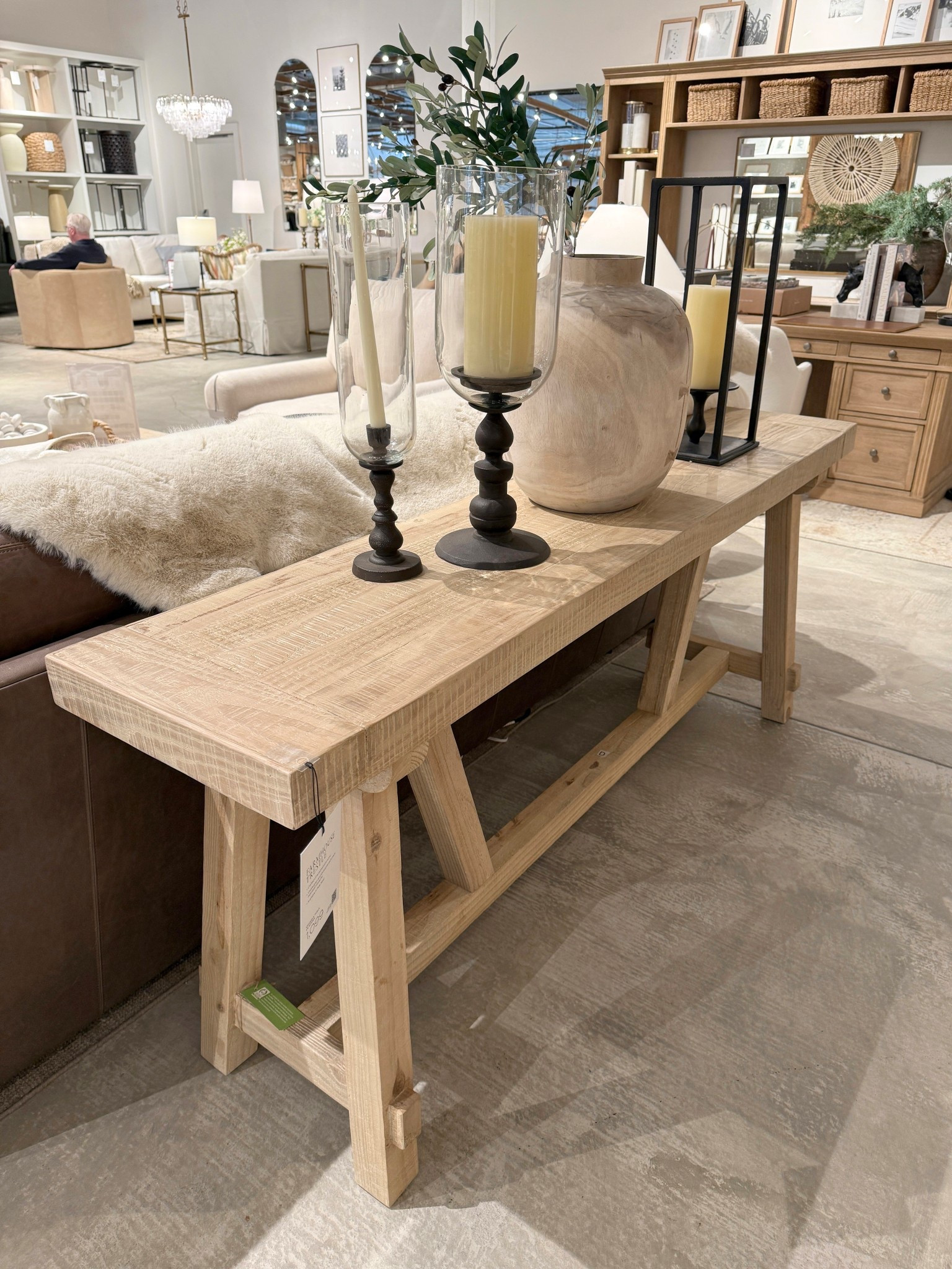 Modern farmhouse favorite! 🫶🏻 The Farmhouse Trestle Console Table from Pottery Barn is crafted from solid reclaimed pine wood in a beautiful Pale Sand finish, giving it that warm rustic charm. ✨ The trestle base and natural wood tones make it a perfect piece for an entryway or styled behind a sofa. 🌿 A timeless console that brings relaxed modern farmhouse style into the home. Linked here! ✨☺️ #PotteryBarn #ConsoleTable
#ModernFarmhouse 

#LTKHome #LTKSaleAlert