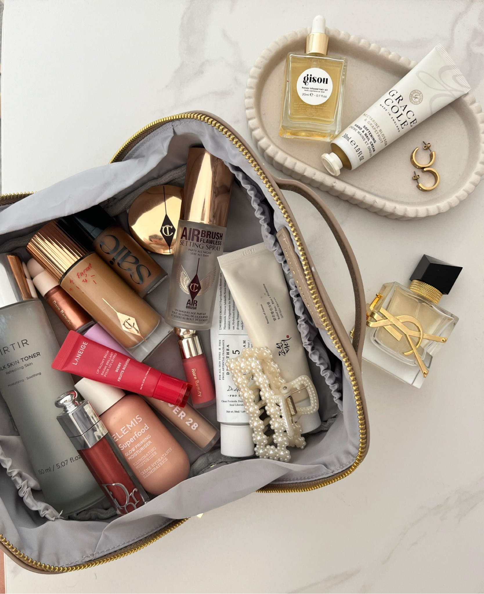 Makeup bag essentials, dewy makeup routine, glass skin skincare routine, Korean skincare recommendations, Haircare essentials

#LTKbeauty #LTKuk #LTKluxury