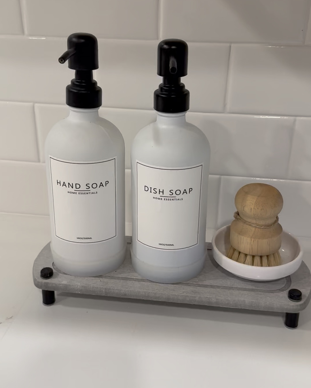 Favorite soap dispenser on a diatomaceous earth stand! Keeps your counters dry!