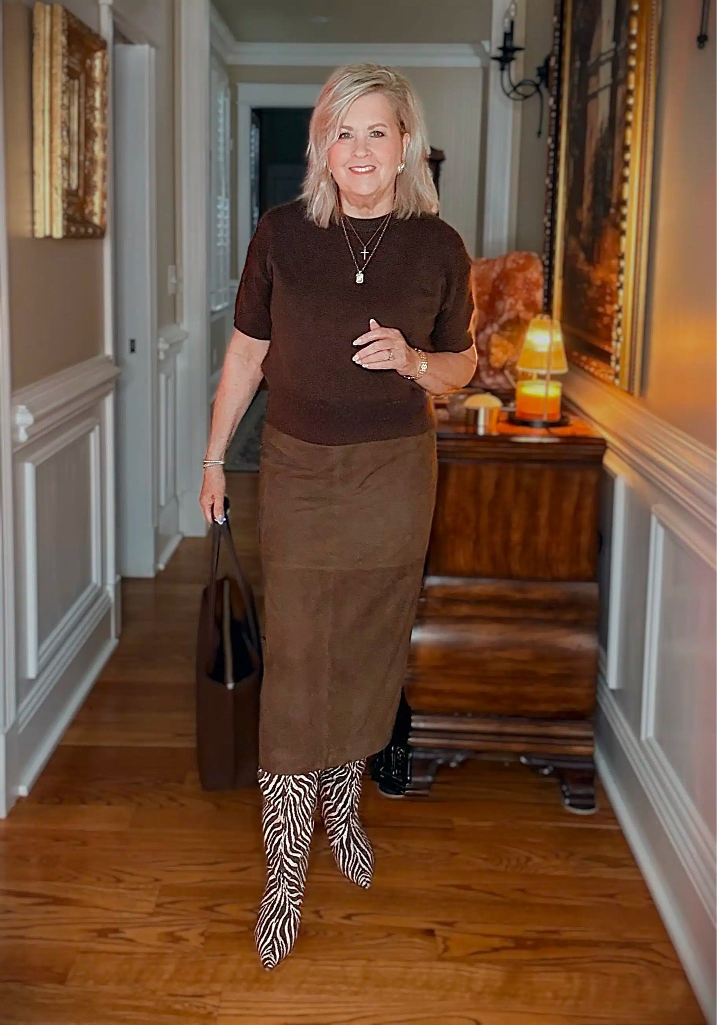 This outfit is gorgeous for moving into Fall! This is a great way to add in some zebra print to an outfit and these boots are a show stopper! My top and skirt are both a size medium.

#LTKWorkwear #LTKOver40 #LTKootd