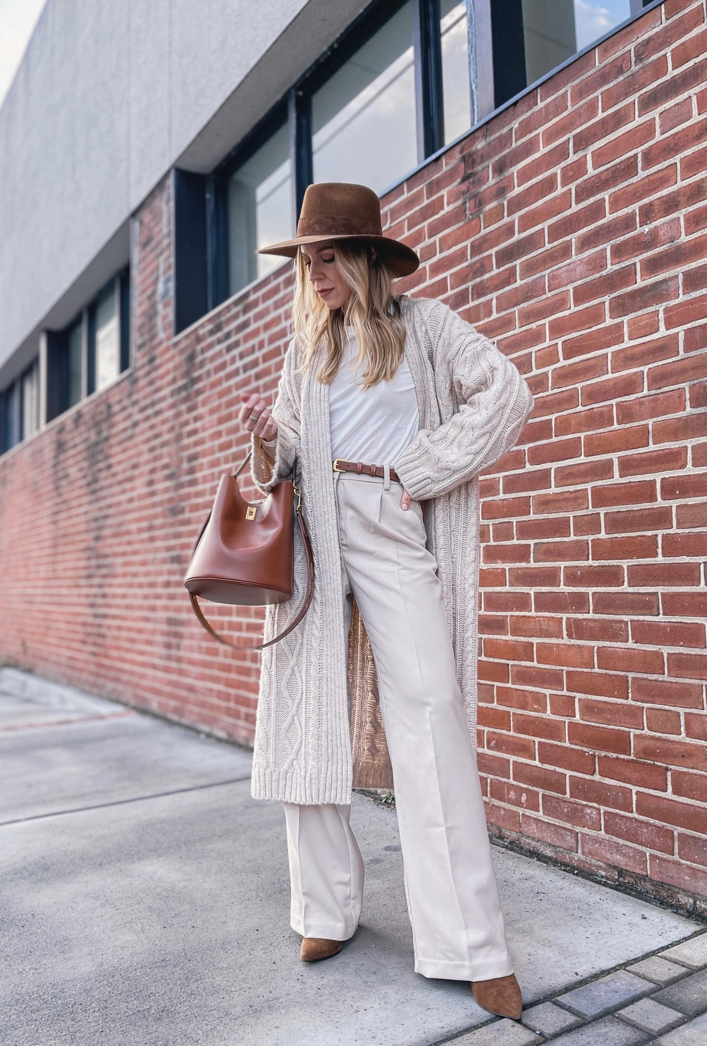 Neutral spring outfit, long cardigan, beige wide leg trousers, brown wool hat, Celine bucket bag

#LTKitbag #LTKstyletip #LTKunder50