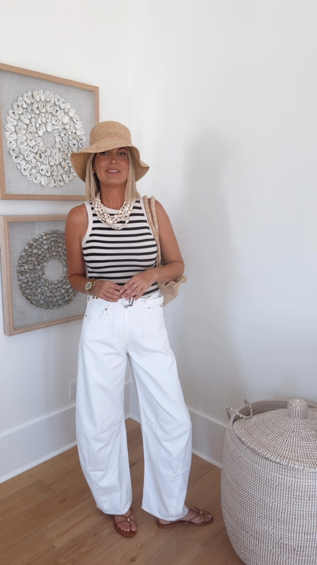 This tank is on sale for $5 today!!! I am 5’11” wearing small in the tank and 27 tall in the white jeans.

#LTKTall #LTKSaleAlert #LTKOver40