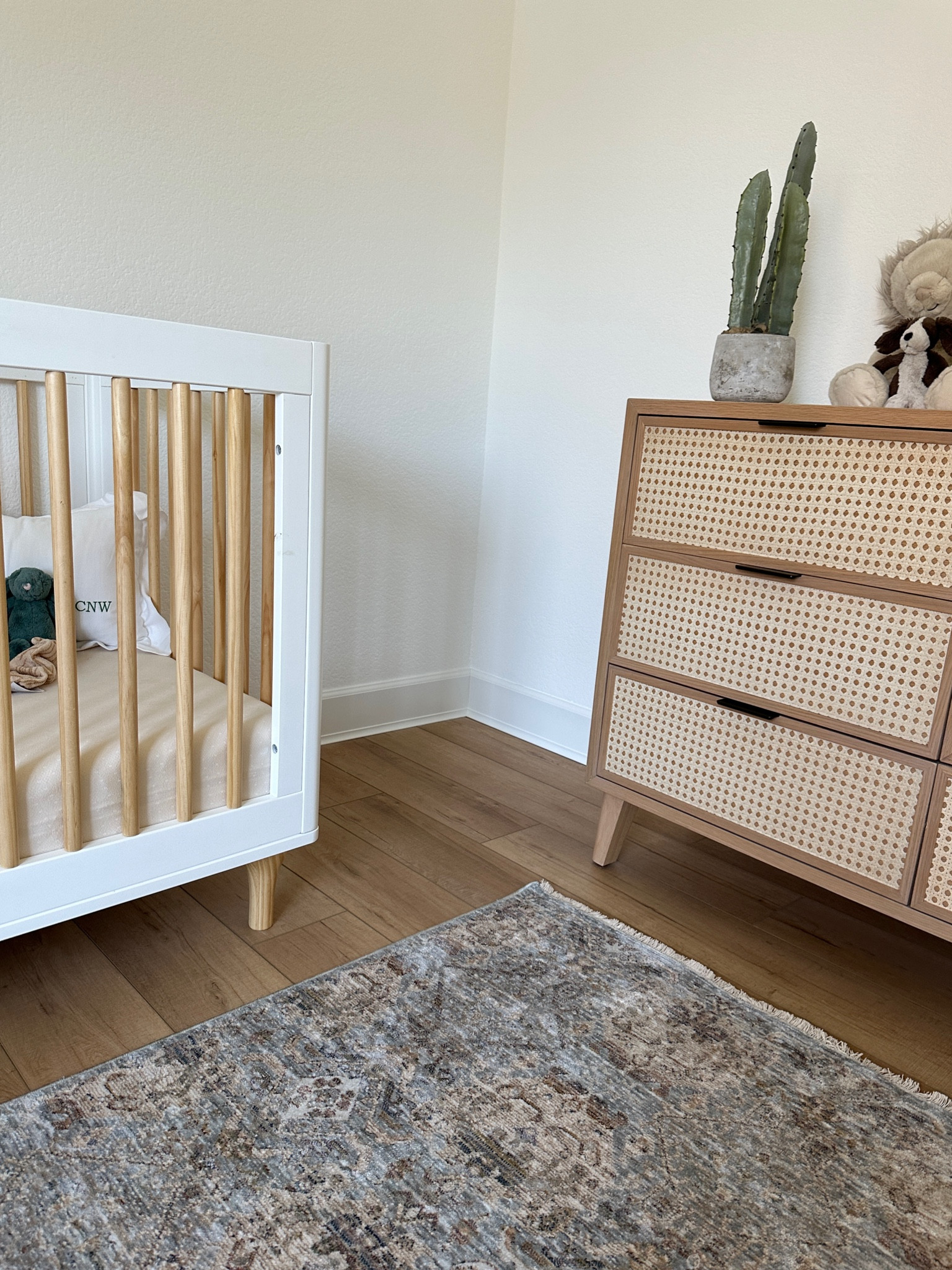 Caidans nursery 🫶🏼  These earth tones and natural wood details are just one of those spots in the new house where instantly feel relaxing being in.. will have fun with wall decor, shelving and an accent wall to come!! 

Sharing his nursery decor I've been shopping, especially this rug that's even prettier in person all linked to shop. 

#LTKfamily #LTKhome #LTKbaby