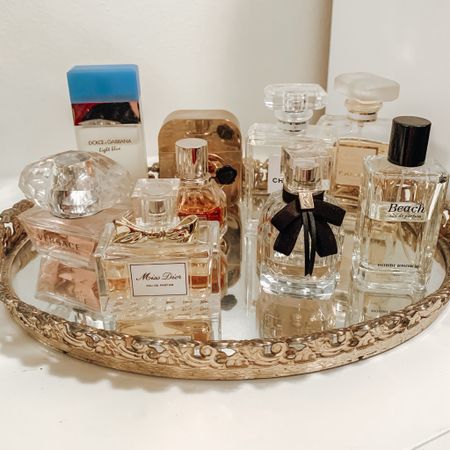 Do you have a signature scent? Let me know what it is below. Clearly, by looking at my perfume collection I do not. 🤷🏻‍♀️ 

I tend switch my fragrance with the season and occasion.  My go-to favorites this time of year are Beach by Bobbi Brown and Mon Paris by YSL. 

Perfume would make a great Mother’s Day gift along with a a pretty tray. Mine is an antique from my grandmother, but I’ve linked some other options in the @liketoknow.it app. 



#LTKBeauty #LTKGiftGuide #LTKFindsUnder100