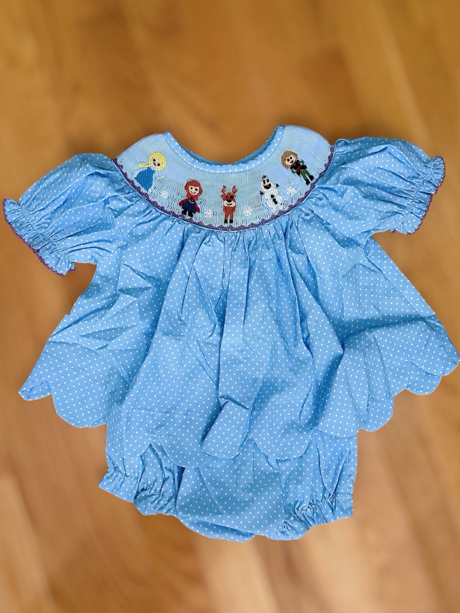 Frozen Smocked Bubble Set for Little Girls ❄️🩵

Every little Frozen fan needs this heirloom-worthy outfit! ✨ This beautiful hand-smocked bubble features Elsa, Anna, Olaf, Sven, and Kristoff on the sweetest blue polka dot fabric with scalloped details and classic puff sleeves. It’s the perfect boutique outfit for Disney vacations, character dining, birthdays, holiday celebrations, or everyday princess adventures. A timeless keepsake that’s as magical as the memories she’ll make wearing it!

Frozen smocked bubble, Elsa outfit, Anna outfit, Disney boutique clothing, heirloom children’s clothing, toddler Disney outfit, Frozen birthday outfit, Disney vacation outfit, character dining outfit, little girl boutique fashion, classic children’s clothing, princess outfit, Disney parks style, magical family memories.

#LTKTravel #LTKKids #LTKBaby
