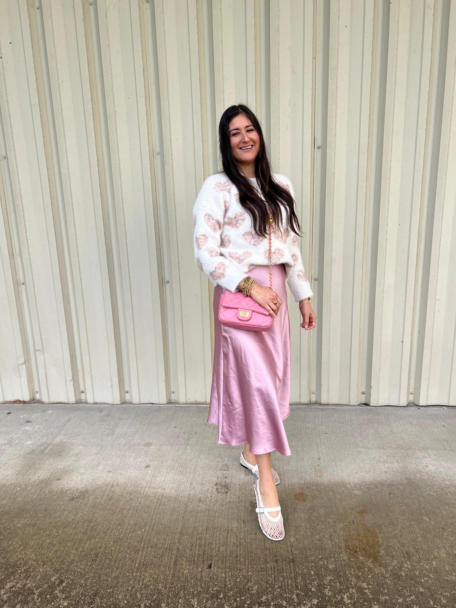 Heart sweaters for the win. Love this satin skirt. It has an elastic waist band but also a zipper too. It comes in multiple colors. 

#LTKValentine #LTKWorkwear #LTKootd