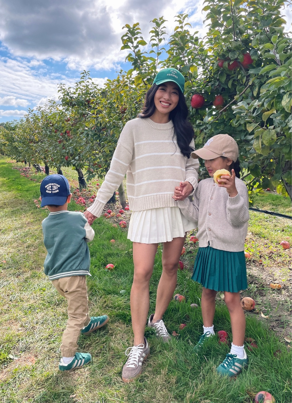 Fall family outfits 

On me:
• Cotton stripe sweater xs - there’s a “mom and me” matching kids one in ivory stripe! Petite friendly length, relaxed fit. Several cute color combos! 

• Abercrombie skirt xxs. Side zipper, fits me well. 

• Adidas Spezial sneakers 5 . TTS but if you’re between half sizes then size down. 

more comfy than all my other adidas sneakers. I hunted this color down on StockX and love themso much.

On Nori:
• H&M kids cardigan , size up for an oversized look 

• Abercrombie girls pleated skort 5/6. Has a matching hoodie. This is stretchy and washes well . 

Women can wear the bigger sizes as you can see in the customer reviews. I tried the kids 13 and it was a little loose on me and longer than how I like my mini skirts 

• Adidas gazelles kids 

On Rio:
• Gap little boys pull on joggers 3T. A staple I buy each year along with the softer H&M cargo joggers linked 

• Old H&M kids baseball sweatshirt jacket, linked similar

• Adidas toddler velcro sneakers 

#LTKSeasonal #LTKFamily #LTKKids