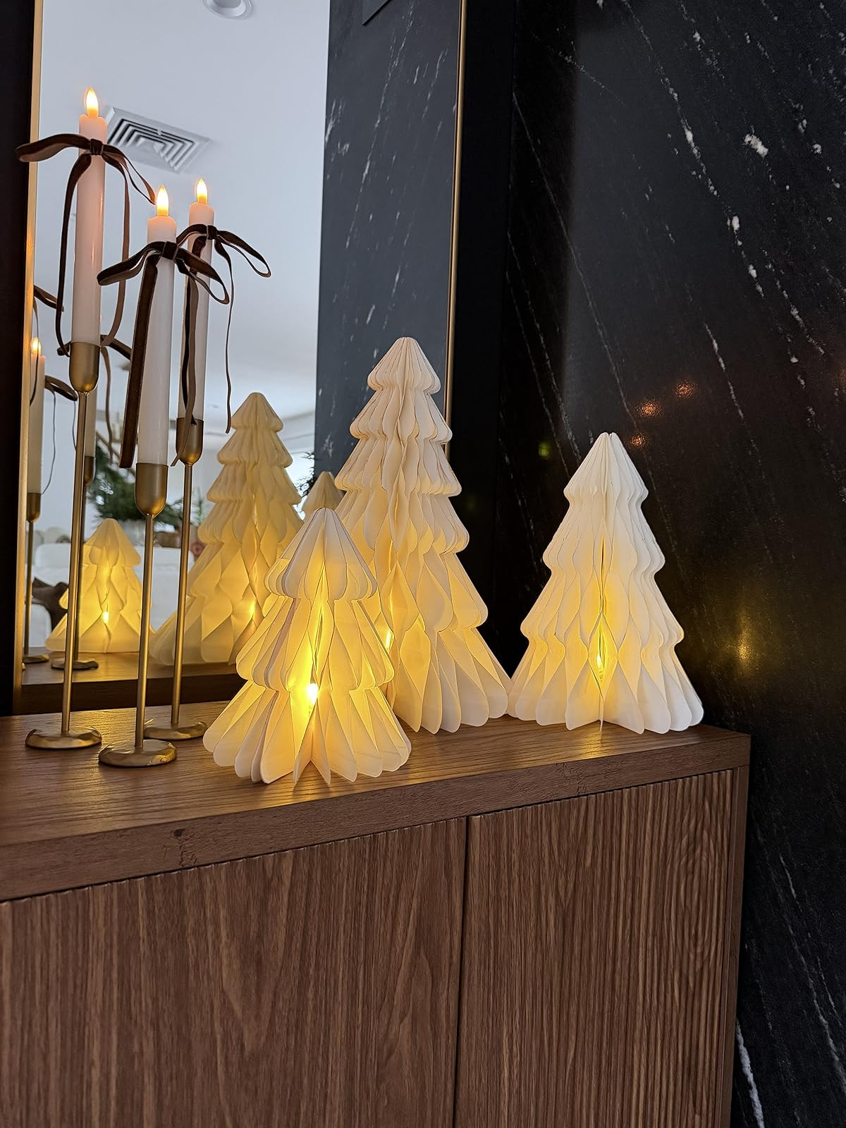 Light up accordion Christmas paper trees. Honeycomb trees. Fluted cabinet. Tapered candles. Gold candlestick holders. Brown velvet bows. #christmasdecor #holidayvibes | Amazon (US)