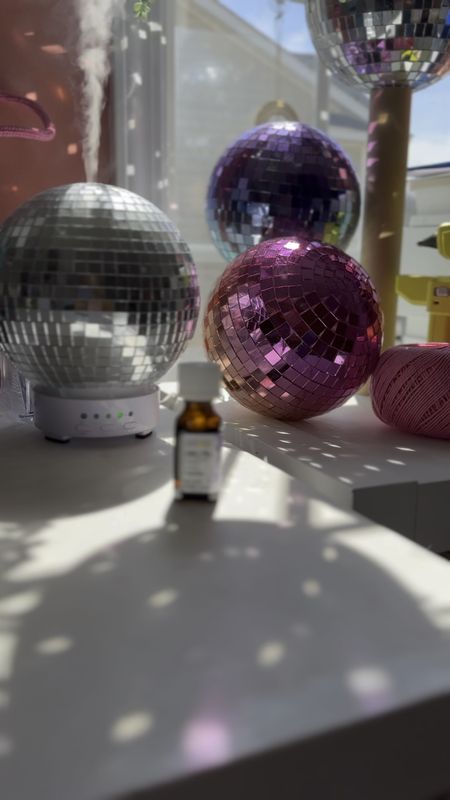 The best essential oils for my work from home vibes. This oil diffuser creates a whole vibe for relaxing and getting work done. Essential oil called Chill Pill is my current favorite. Disco ball oil diffuser, Disco ball diffuser, Disco Diffuser 

#LTKfindsunder50 #LTKstyletip #LTKhome