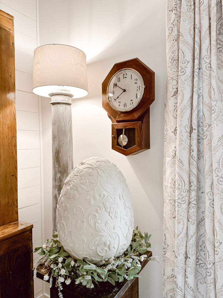 Here is a previous look in our living room from last Easter. We layered some pieces in the corner of the room. This large egg is on a tall pedestal sitting atop of Spring wreath.  

 #LTKHome