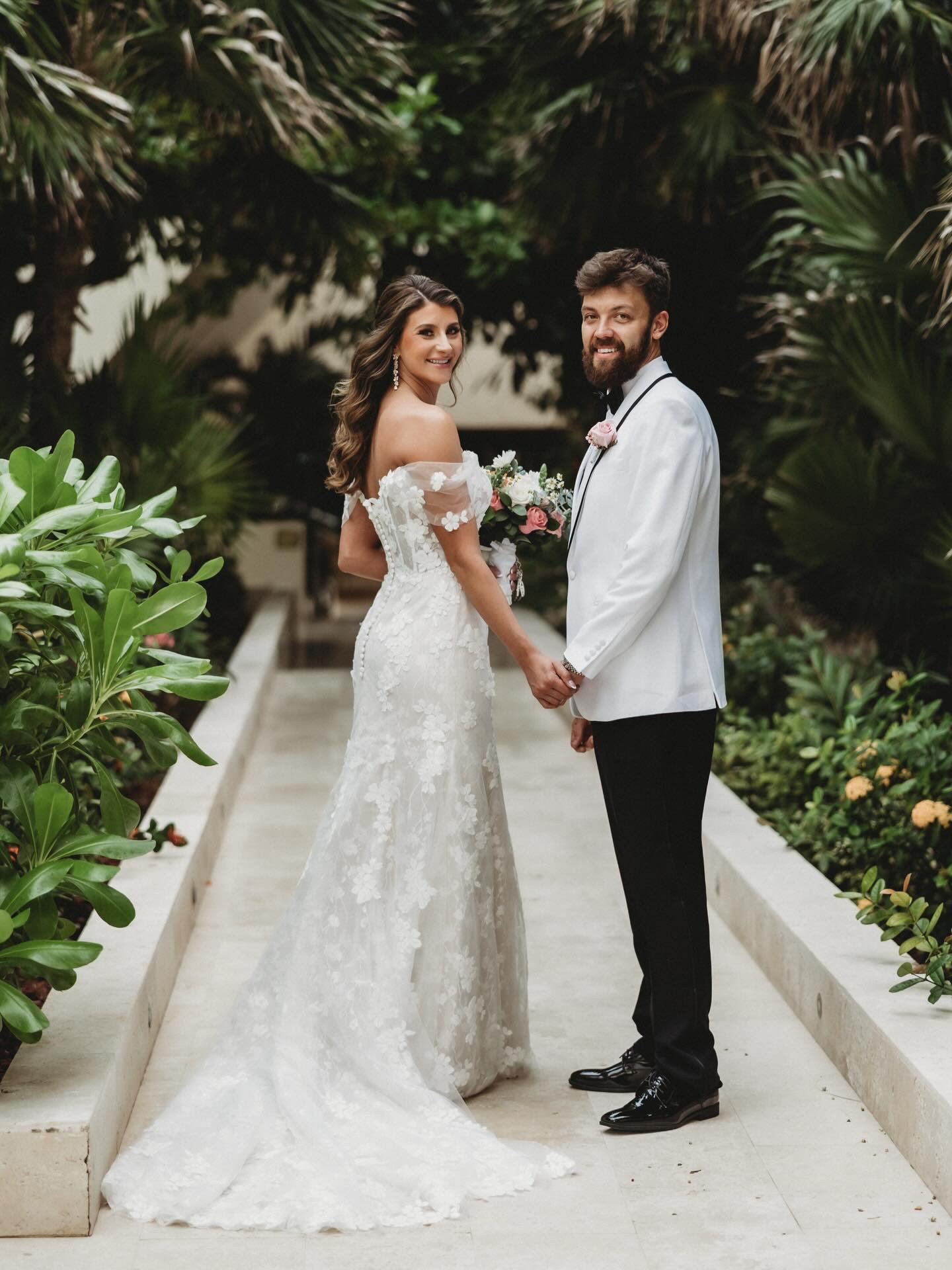 1 month of being married to my best friend! I love you Dalty & I love doing life with you 🤍💍

Venue: @hyattzivacancun 
Photography: @dreambellaphotography 
Content Creator: @sobridalsocial 
Makeup: @luispizarrobeauty 
Hair Stylist: @stylingtrio 
Officiant: @aharris78 
Florals/Decor: @stareventsmexico 
Dress: @justinalexander 
Shoes: @aminamuaddiofficial 
Tuxedo: @blacktieowntheroom 
Rings: @helzbergdiamonds 
Jewelry: @untamedpetals