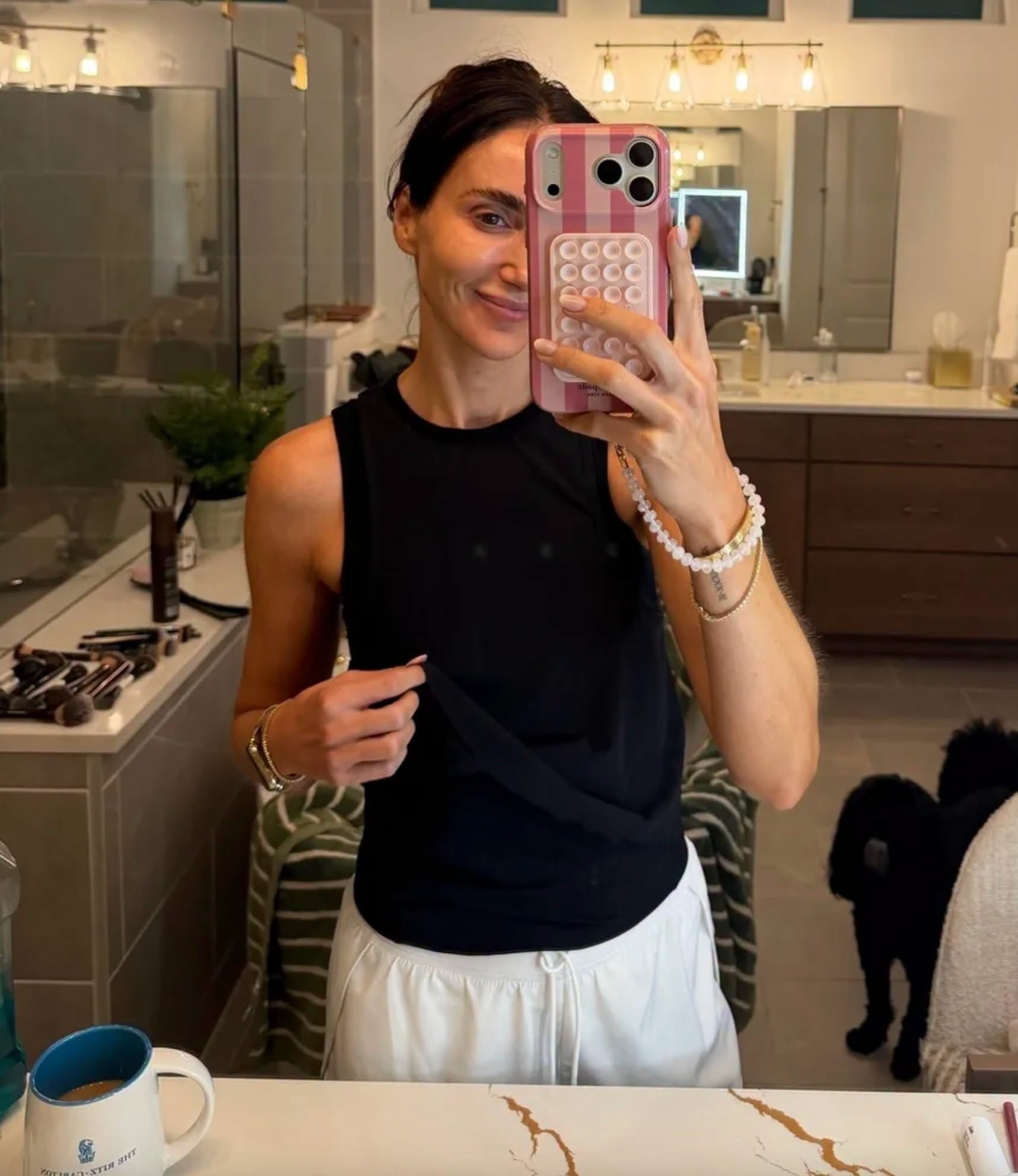 This double lined activewear top is SO good when you want a little more coverage without adding another layer. The simple shape works for workouts, errands, or paired with easy pants for an everyday athleisure look.

double lined activewear top, workout tank, black activewear top, athleisure outfit, workout clothes, womens activewear, gym outfit, everyday tank, black tank top, activewear finds, annabrstyle

#LTKootd #LTKSeasonal #LTKActive