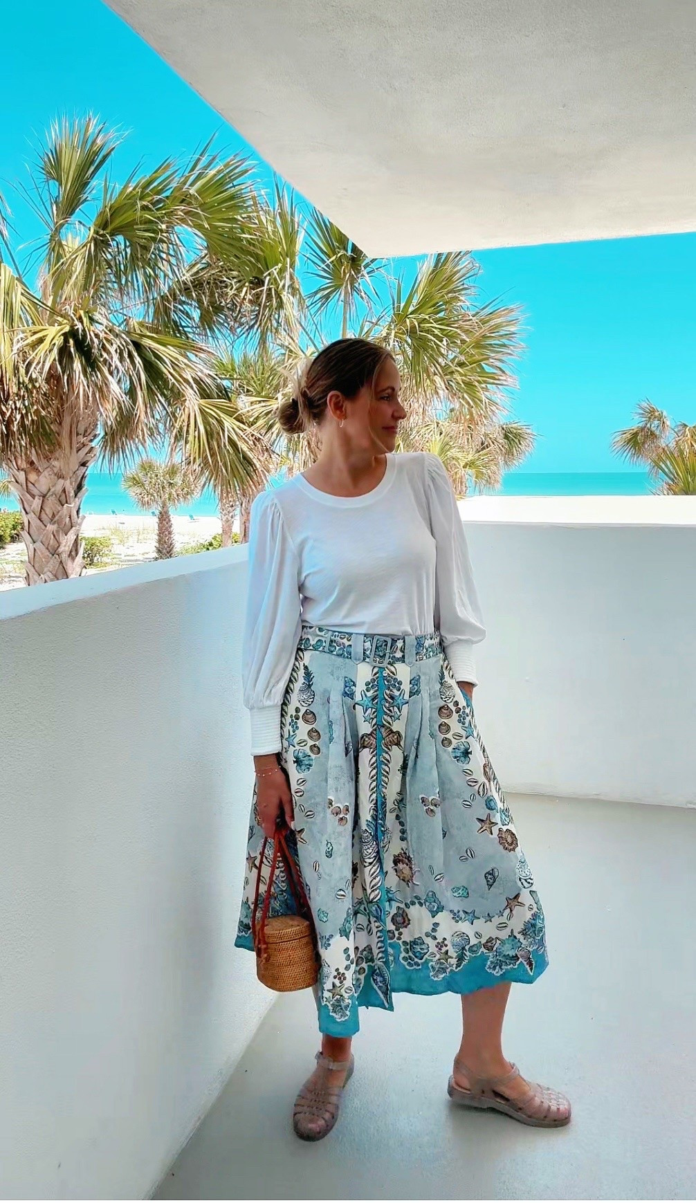 Light, breezy, comfortable due to the elastic waist, and stunning! Can’t wait to wear this midi skirt all summer! These jelly shoes are the ultimate statement piece! Use code TWINTALK20 for 20% off your purchase through May 11th! 

#LTKOver40 #LTKStyleTip #LTKShoeCrush