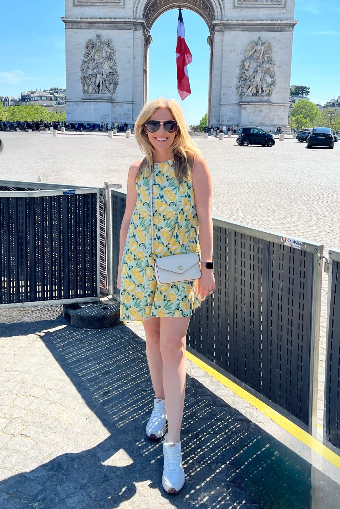 Casual summer outfit 
Summer dress 
Abercrombie dress 
Lemon print dress 
Summer travel look 
Casual travel look 
Nike sneakers 

#LTKTravel #LTKSaleAlert #LTKFindsUnder100