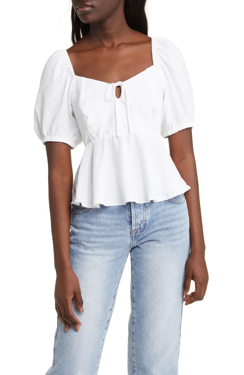 Charming puff sleeves frame this square-neck top punctuated with a flouncy peplum. | Nordstrom
