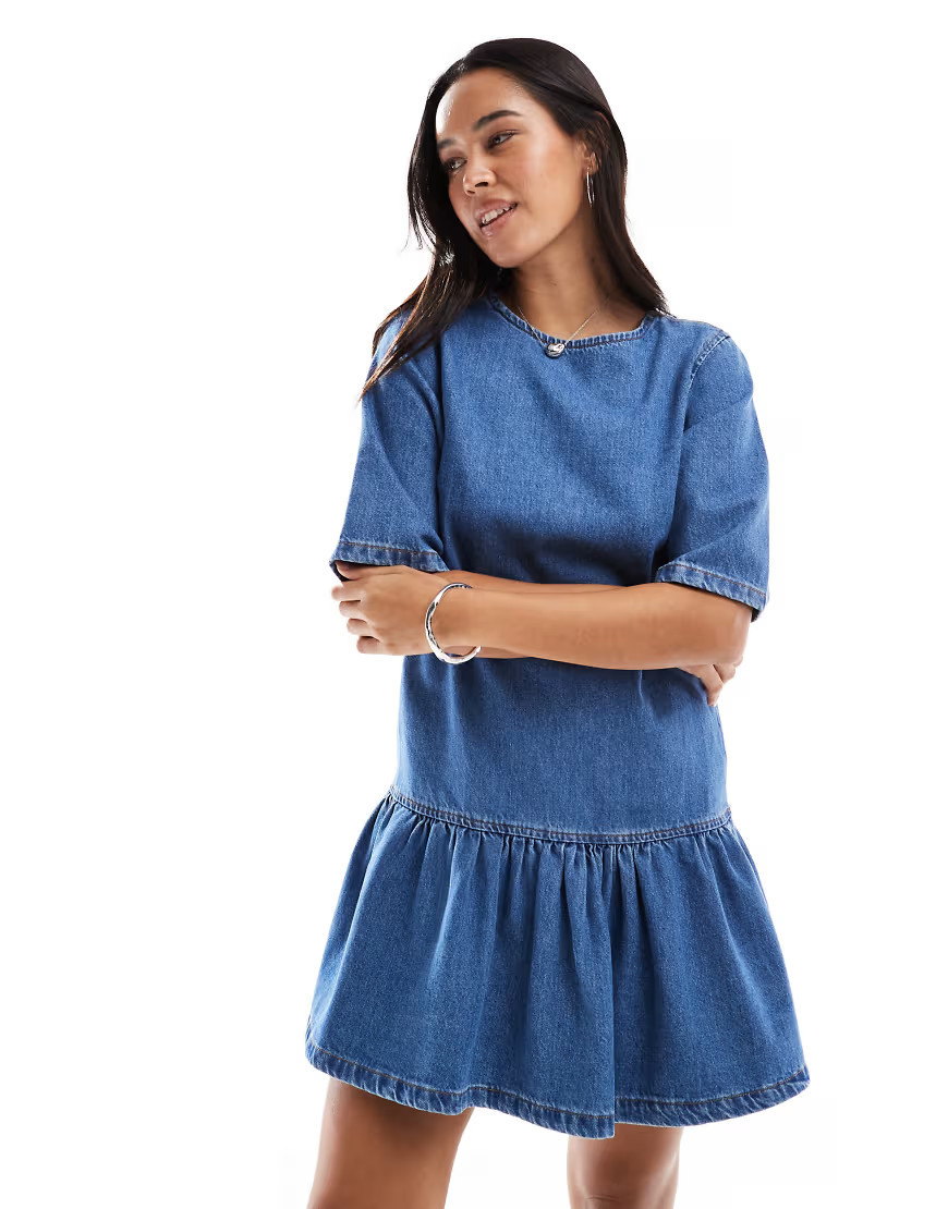 ASOS DESIGN denim t-shirt mini dress with drop waist in midwash blue | ASOS (Global)