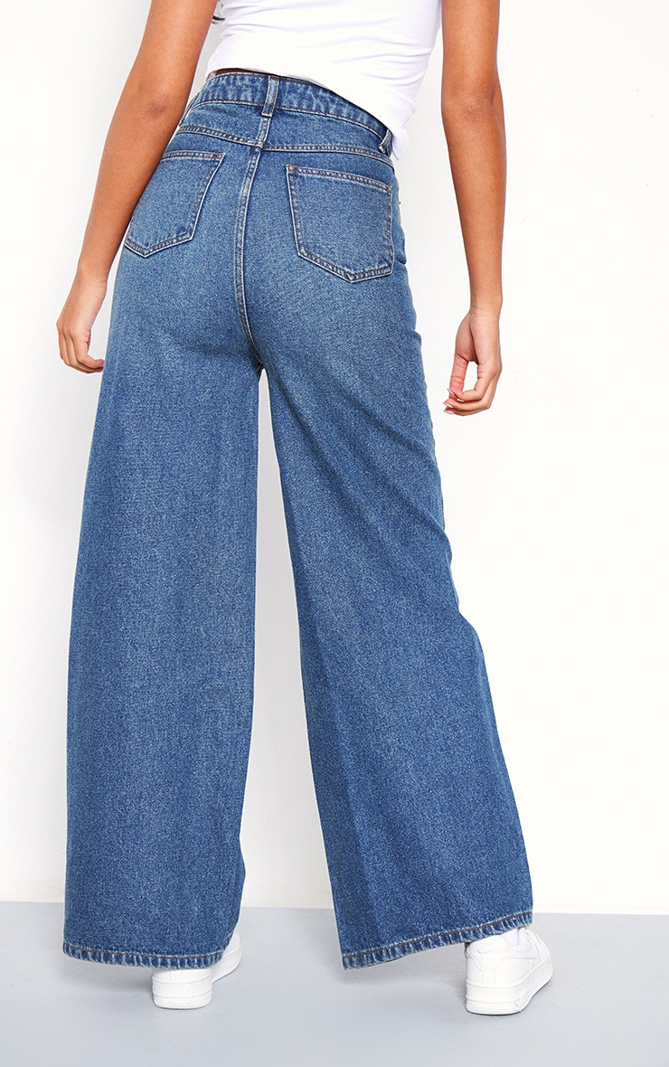 Tall Washed Indigo Low Waist Extreme Wide Leg Jeans | PrettyLittleThing US