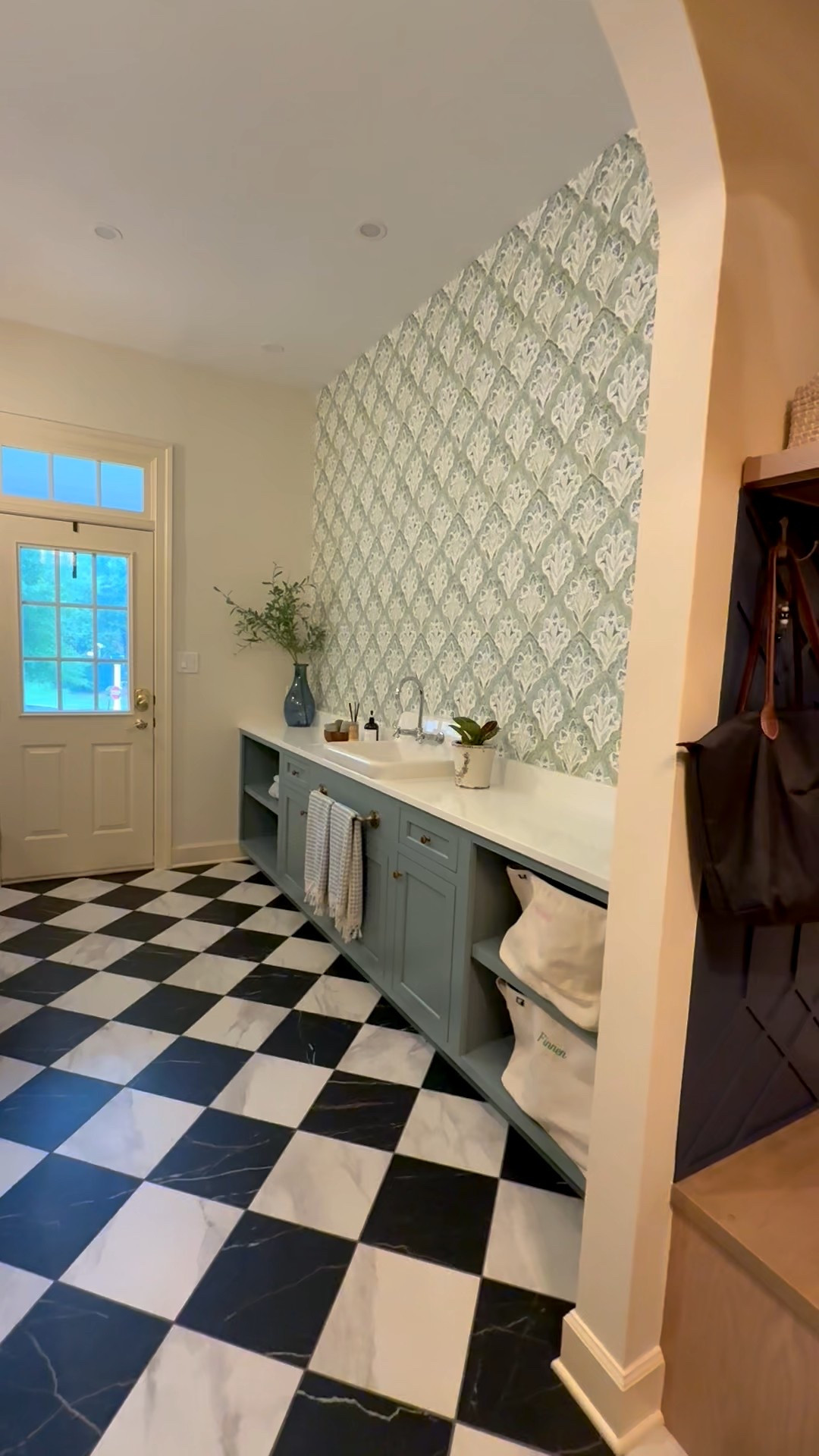 Laundry room update. Wallpaper finally added on the accent wall. Black and white checkered flooring is perpetuo in brilliant white and infinite black. Favorite big load laundry machine and dryer. Best canvas large storage tote bags. Decorative pieces for decor finishing touches. Big family must have with little children  

#LTKStyleTip #LTKFamily #LTKHome
