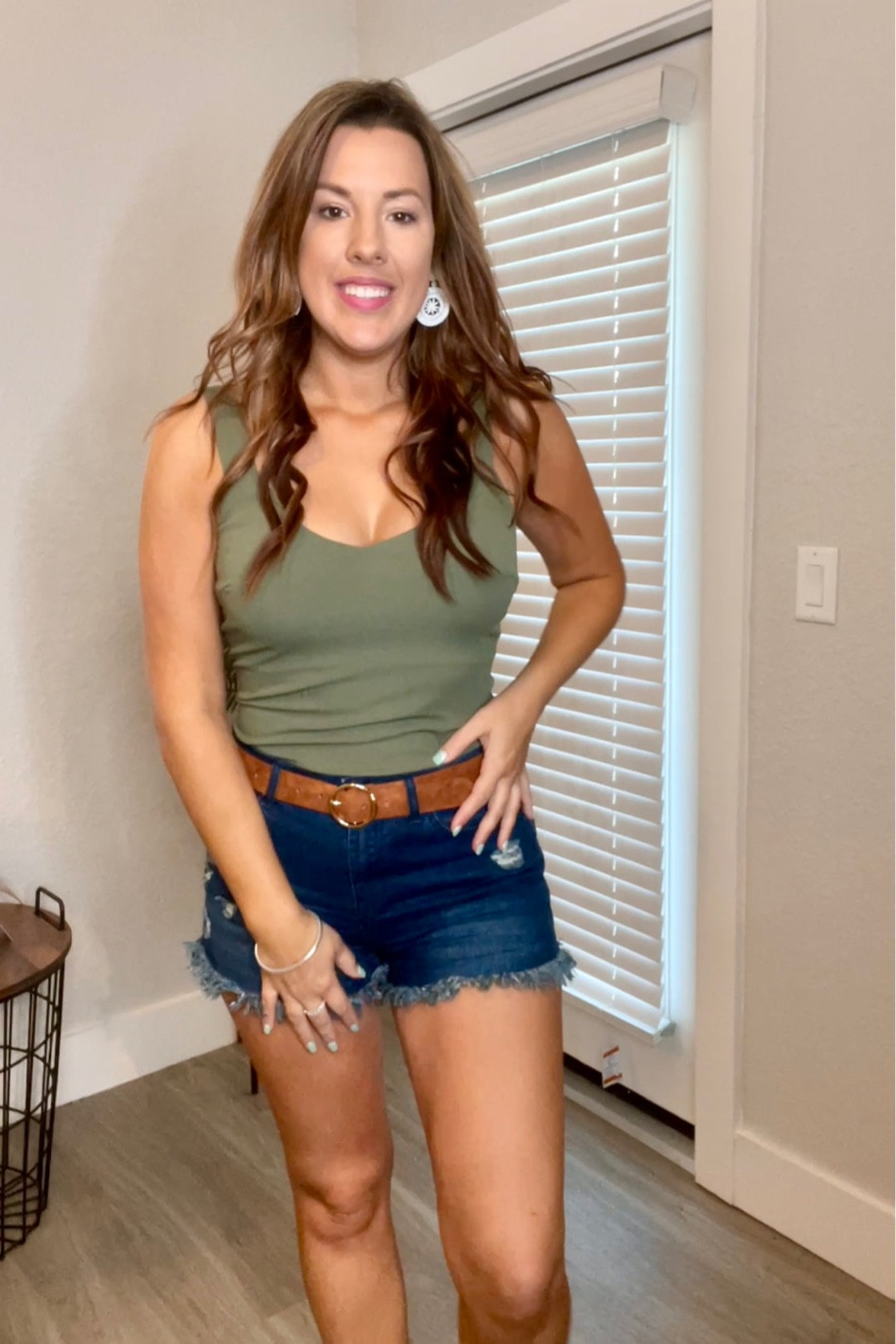 Greens and browns 💚🤎
Pair this olive green tank (has thicker lining at the top but not a shelf bra) with your favorite brown belt  

#LTKstyletip