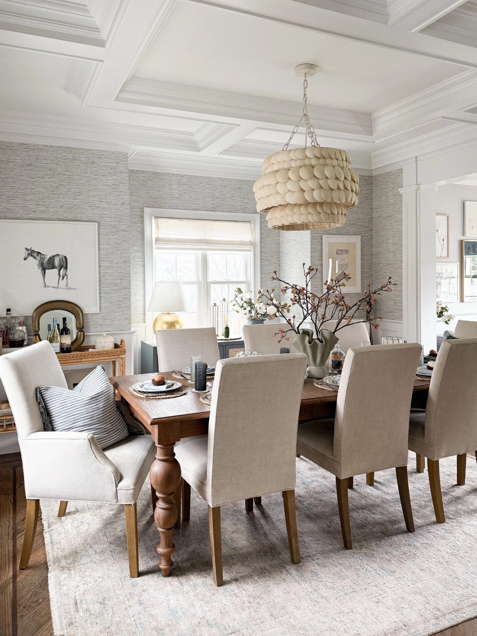 
Dining room inspo for neutral decor home. Anchored by the wood table, the upholstered chairs create a comfy space perfect for guests and everyday use. The lighting fixture brings the whole room together.

Dining room coastal decor neutral design upholstered dining chairs floral dining centerpiece  statement lighting fixture spring tablescape spring decor spring refresh

#LTKHome #LTKSeasonal