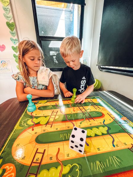 Pro Tip: add games into your homeschooling to make learning fun. 
We love this giant snakes and ladders game. It’s great for working on number skills like counting forward and backward. And practice skills like patience, taking turns, and winning/losing. 
#homeschool #learninggames

#LTKkids #LTKfamily