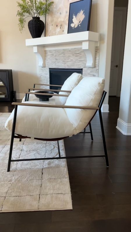 @kathykuohome does it again (ad)! My dream chairs have arrived and they stole my heart - check out that leather detail! 💫 Obsessed with the chic combo of black iron, white performance fabric, and brown leather straps. Perfection achieved! ✨ #HomeDecorGoals #KathyKuoHome #DreamyChairs
#lovewhereyoulive

#LTKsalealert #LTKVideo #LTKhome