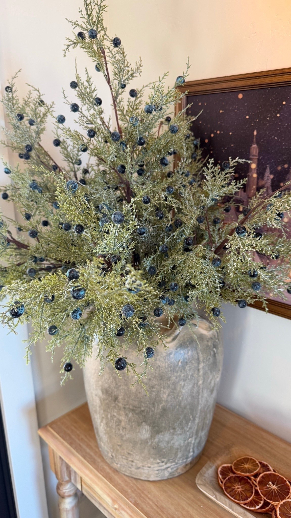 Loving these realistic juniper stems in my foyer for winter! 🌿🤎 They look so fresh and add the prettiest touch of greenery without feeling overly festive.

I love how simple seasonal greenery can instantly make an entryway feel warmer, cozier, and more inviting. ✨

Such an easy way to refresh your home for winter while keeping that timeless, collected look.

#LTKHome #LTKSeasonal #LTKmomlife