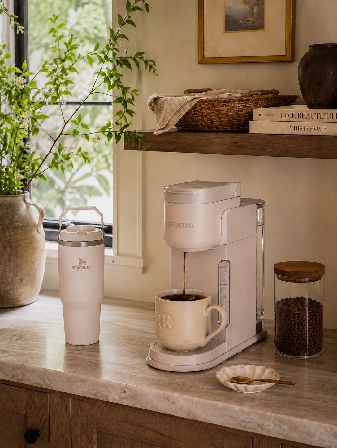 Coffee Bar Goals ☕🤍

There’s nothing better than starting the day with a fresh cup of coffee in a space that feels both beautiful and functional. This cozy coffee station combines two Prime Day favorites—the Keurig coffee maker and Stanley tumbler—for the perfect morning routine upgrade. Warm wood tones, soft neutrals, and timeless styling make this setup feel straight out of a designer kitchen.

Follow @farmtotablecreations on Instagram for more cozy home finds and trending decor.

✨ Shop this coffee bar look, including the Keurig, Stanley tumbler, coffee storage canister, and kitchen decor linked in my LTK! #LTKHome #AmazonPrimeDay #CoffeeBar #Keurig #StanleyCup #KitchenDecor #AmazonHome #CozyHome #CoffeeLover #HomeDecorFinds #KitchenInspiration #LTKSaleAlert

#LTKSaleAlert #LTKHome